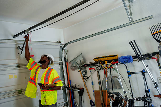Professional Garage Door Panel Replacement technician working in Haledon, NJ